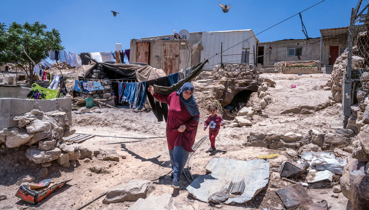 Residents of Kirbet at Tabban, one of 13 communities at risk of forcible transfer in Masafer Yatta, southern West Bank, 16 June 2022. ©Photo by OCHA