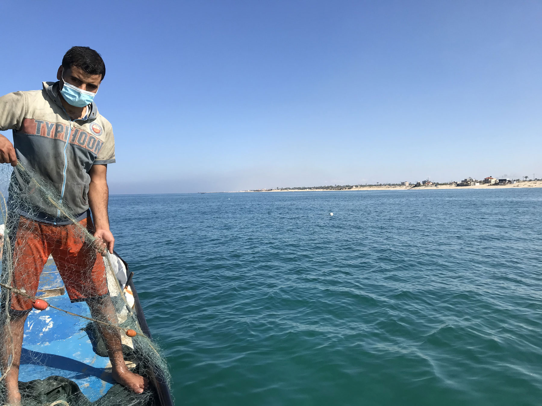 Shadi Qanan on his repaired boat.