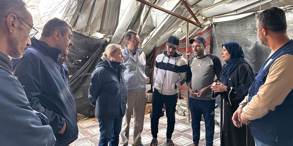 UN team, led by the Deputy Humanitarian Coordinator, speaks with one of the families in Khan Younis as part of ongoing assessments to guide lifesaving assistance. Photo: OCHA 