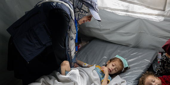 A 7-year-old girl with severe acute malnutrition and dehydration was transferred from Kamal Adwan hospital in Gaza to a field hospital in the south. Photo by WHO