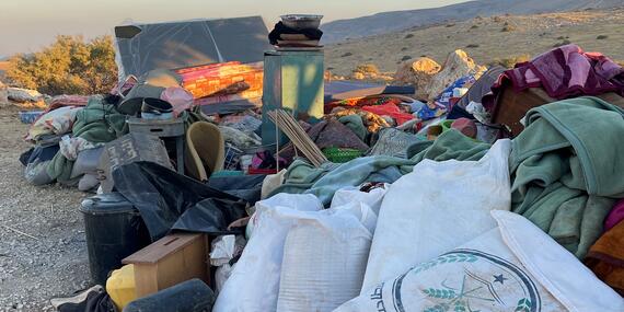 The belongings of people whose homes were demolished or confiscated in Humsa Al Bqai'a, after being dropped off away from the community. 7 July 2021