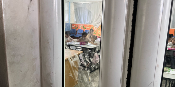 Children benefitting from informal learning activities in a school-turned-shelter in Al Maghazi refugee camp, in Deir al Balah. Teaching is focused on essential literacy and numeracy skills. Photo by OCHA