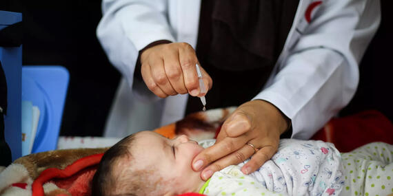 A baby receives routine vaccinations. Photo: UNICEF