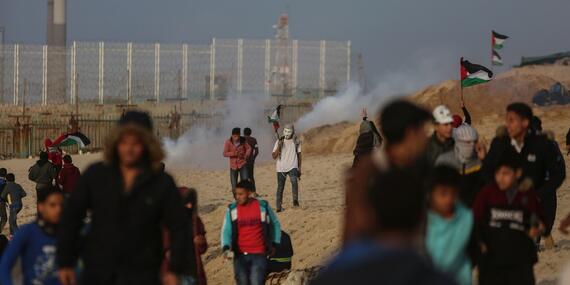 A boy in a demonstration at the fence in Beit Lahiya. Gaza, 2 February, 2018. © Photo by Mohammed Dahman