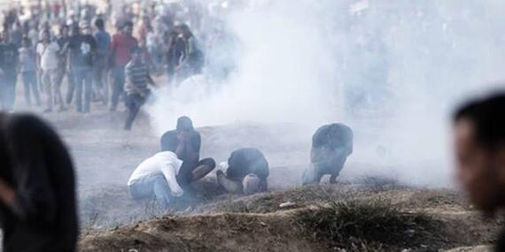 Demonstrators overcome by teargas at the Gaza fence, March 2019.