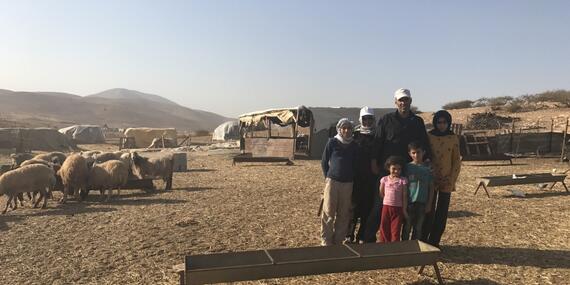 Bisharat family, standing in front of their residence which is at imminent threat of demolition, Makhul, 18 October 2017. © Photo by OCHA