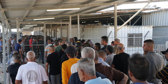 Palestinian workers at Erez crossing. Photo by OCHA