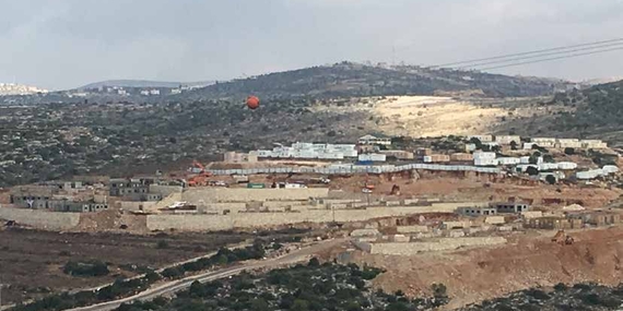 בנייה ואדמות מעובדות במאחז נחלי נחל (דצמבר 2016). תצלום: משרד האו״ם לתיאום עניינים הומניטריים