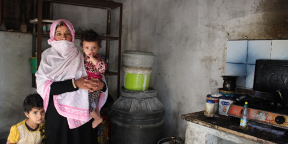 Mona and two of her seven children, in a poor household affected by electricity and water shortages. Rafah, Gaza Strip, October 2017. © Photo by OXFAM