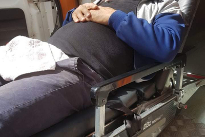 Naji Tanatra at the ambulance that evacuated him to the hospital.