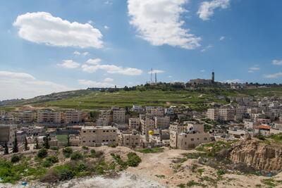 ‘Issawiya, East Jerusalem (foreground), occupied West Bank and Hebrew University (background), 2013. ©  Photo by OCHA