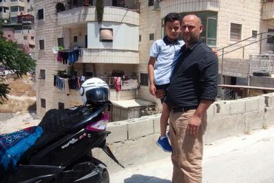 Residents of the building in Wadi Qaddum, 3 June 2022. Photo by OCHA