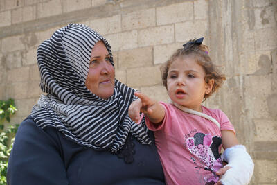 Five-year-old Ahlam needed medical treatment that is unavailable in Gaza, but her parents' exit permit application was delayed for several months, until humanitarian partners stepped in. In early August, she and her mother were in a Jerusalem hospital as hostilities escalated back home. Photo by OCHA