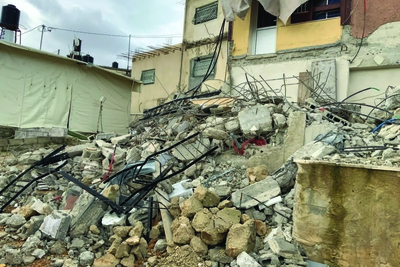 A Palestinian family forced to demolish their home in Jabal al Mukabbir, East Jerusalem. ©Photo by OCHA, 1 February 2023