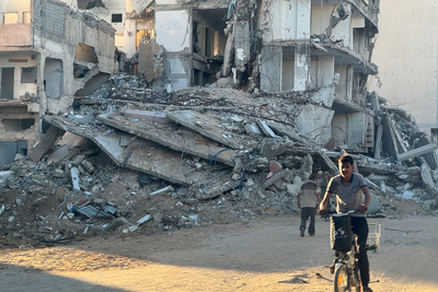 A Palestinian child riding his bicycle in Gaza city on 17 September 2024. Photo by OHCHR/Olga Cherevko
