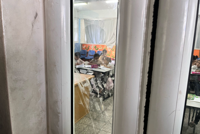Children benefitting from informal learning activities in a school-turned-shelter in Al Maghazi refugee camp, in Deir al Balah. Teaching is focused on essential literacy and numeracy skills. Photo by OCHA