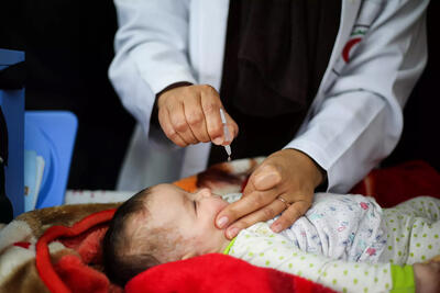 A baby receives routine vaccinations. Photo: UNICEF