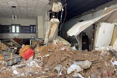 An elderly woman stands amid the ruins of her home, destroyed during a 46-hour Israeli operation in the Jenin refugee camp that began on 18 November 2024. Photo: OCHA.