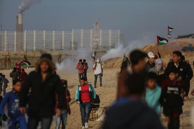 A boy in a demonstration at the fence in Beit Lahiya. Gaza, 2 February, 2018. © Photo by Mohammed Dahman