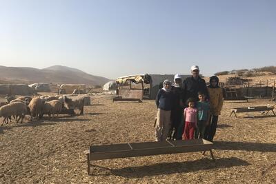 Bisharat family, standing in front of their residence which is at imminent threat of demolition, Makhul, 18 October 2017. © Photo by OCHA